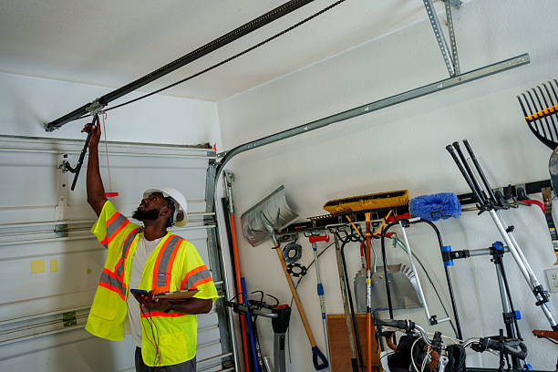 Professional Garage Door Panel Replacement technician working in Athens, PA
